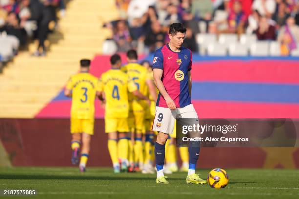 Robert Lewandowski of FC Barcelona looks dejected after Sandro Ramirez of UD Las Palmas scores his team's first goal during the LaLiga match between...