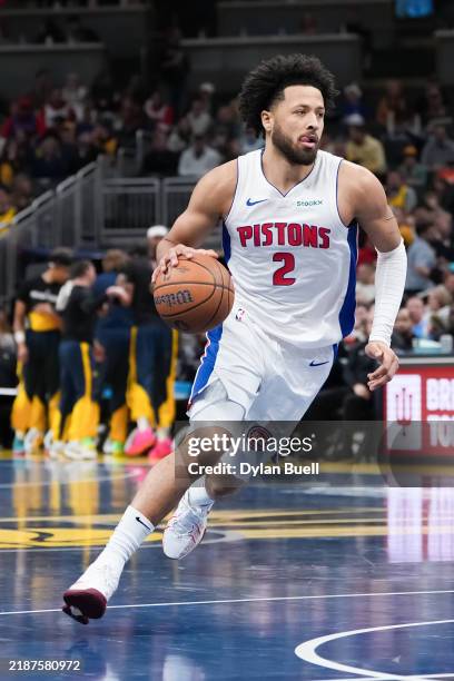 Cade Cunningham of the Detroit Pistons dribbles the ball in the first quarter against the Indiana Pacers of the Emirates NBA Cup game at Gainbridge...