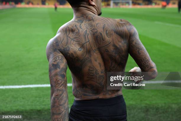 Detailed view of Justin Kluivert of AFC Bournemouth's tattoos following the Premier League match between Wolverhampton Wanderers FC and AFC...