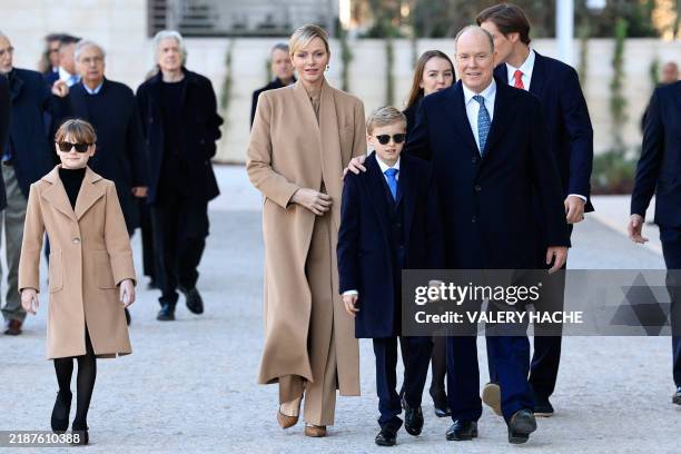 Prince Albert II of Monaco arrives with Princess Charlene of Monaco , Princess Gabriella and Prince Jacques for the inauguration of the new...