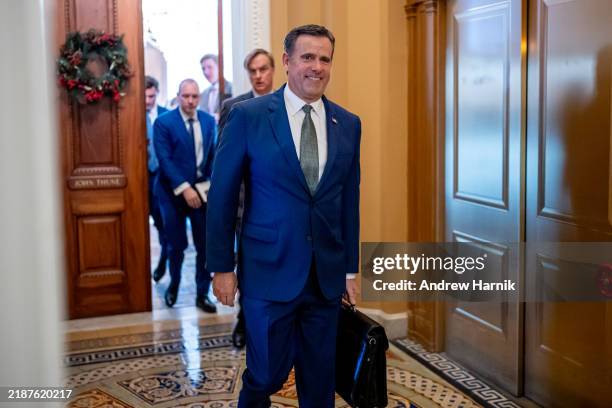 President-elect Donald Trump's nominee to be CIA Director John Ratcliffe walks out of a meeting with Senate Minority Whip John Thune on December 4,...