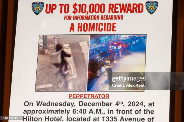 Wanted poster is set up for an NYPD press conference regarding a homicide that authorities believe was a targeted attack at One Police Plaza on...
