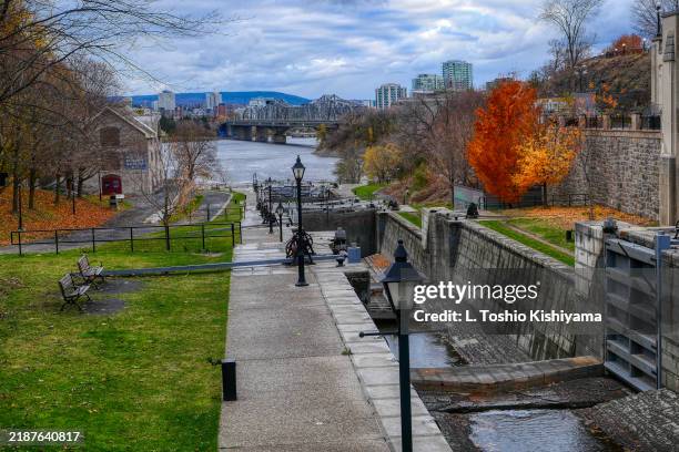 rideau canal in autumn in ottawa, canada - rideau canal stock pictures, royalty-free photos & images