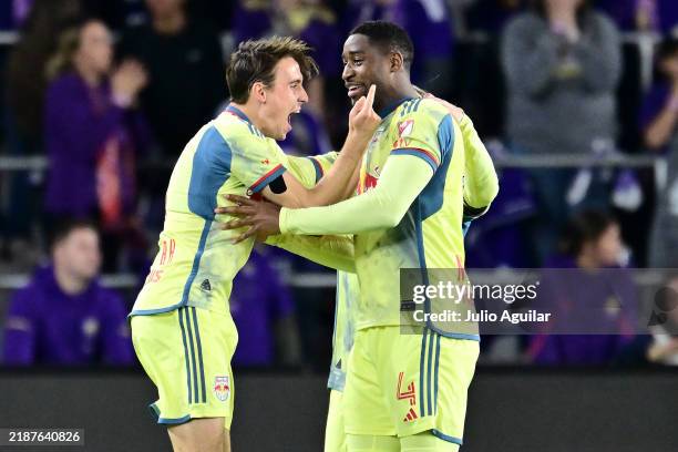 Andrés Reyes of the New York Red Bulls celebrates with teammates after scoring a goal against Orlando City during the second half at Exploria Stadium...