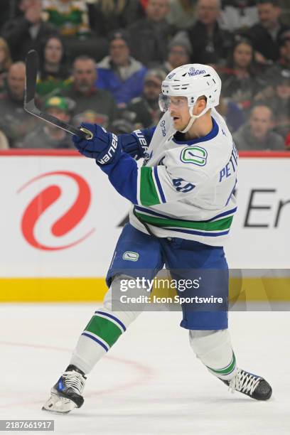 Vancouver Canucks forward Elias Pettersson takes a shot on goal during an NHL game between the Minnesota Wild and Vancouver Canucks on December 3 at...