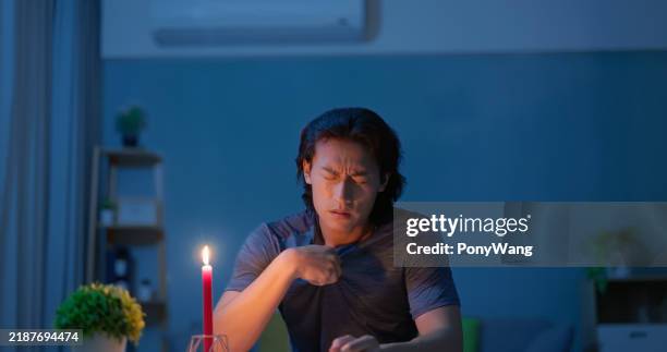asian man with power outage - broken air conditioner stock pictures, royalty-free photos & images