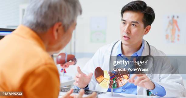 asian elder liver disease consultation - hepatitis stock pictures, royalty-free photos & images