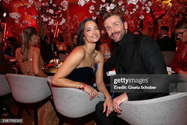 Amira Aly and Christian Dueren during the Mon Cheri Barbara Tag at Schloss Nymphenburg on December 4, 2024 in Munich, Germany.