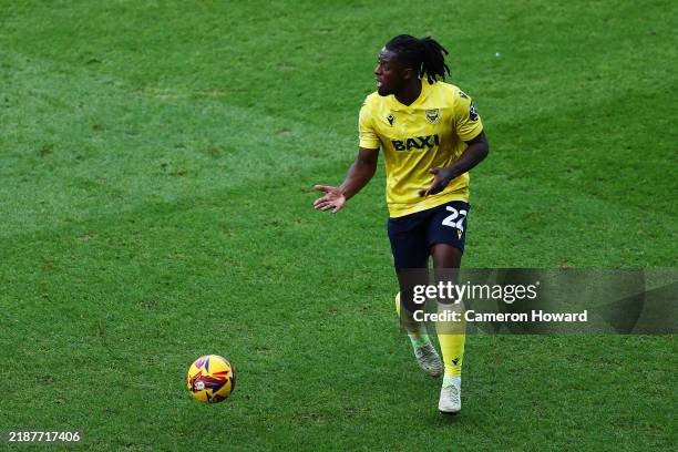 Greg Leigh of Oxford United gestures as he runs with the ball during the Sky Bet Championship match between Oxford United FC and Millwall FC at...