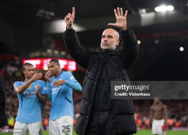 Manchester City manager Pep Guardiola holds up six fingers to the fans indicating the number of Premier League titles he has won after the Premier...