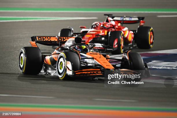 Oscar Piastri of Australia driving the McLaren MCL38 Mercedes leads Charles Leclerc of Monaco driving the Ferrari SF-24 prior to during the F1 Grand...