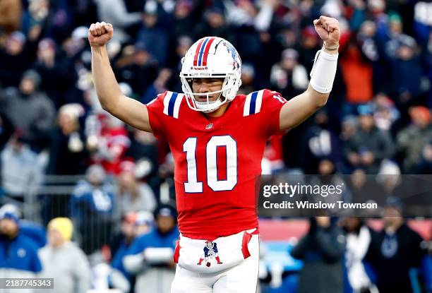 Drake Maye of the New England Patriots reacts after a touchdown in the fourth quarter of a game against the Indianapolis Colts at Gillette Stadium on...