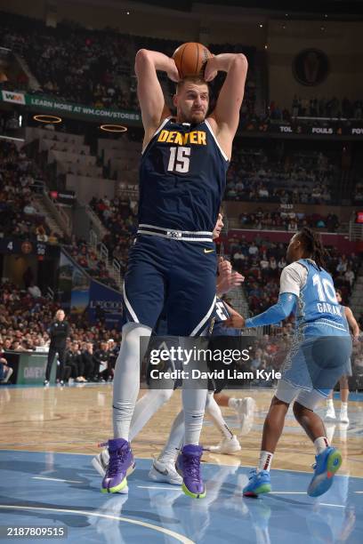 Nikola Jokic of the Denver Nuggets goes up for the rebound during the game against the Cleveland Cavaliers on December 5, 2024 at Rocket Mortgage...
