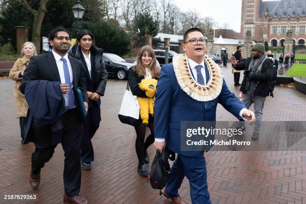 Human rights lawyer and Vanuatu's lead counsel Julian Aguon leaves after small Pacific island states attend hearings inside the International Court...