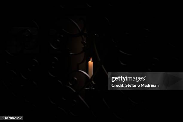 candle lit in church, religion - prayer candle stock pictures, royalty-free photos & images