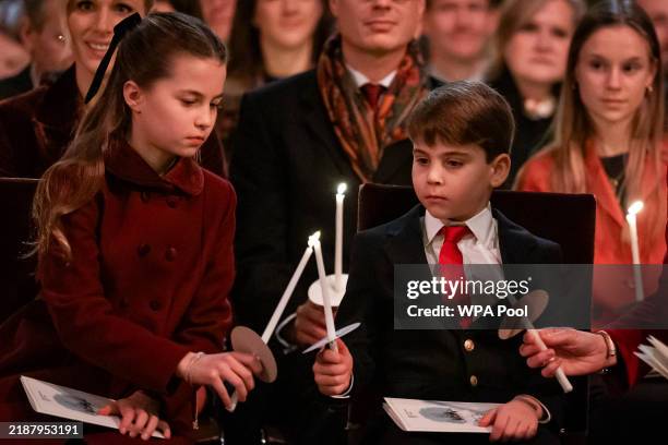 Princess Charlotte and Prince Louis during the 'Together At Christmas' Carol Service at Westminster Abbey on December 6, 2024 in London, England. The...