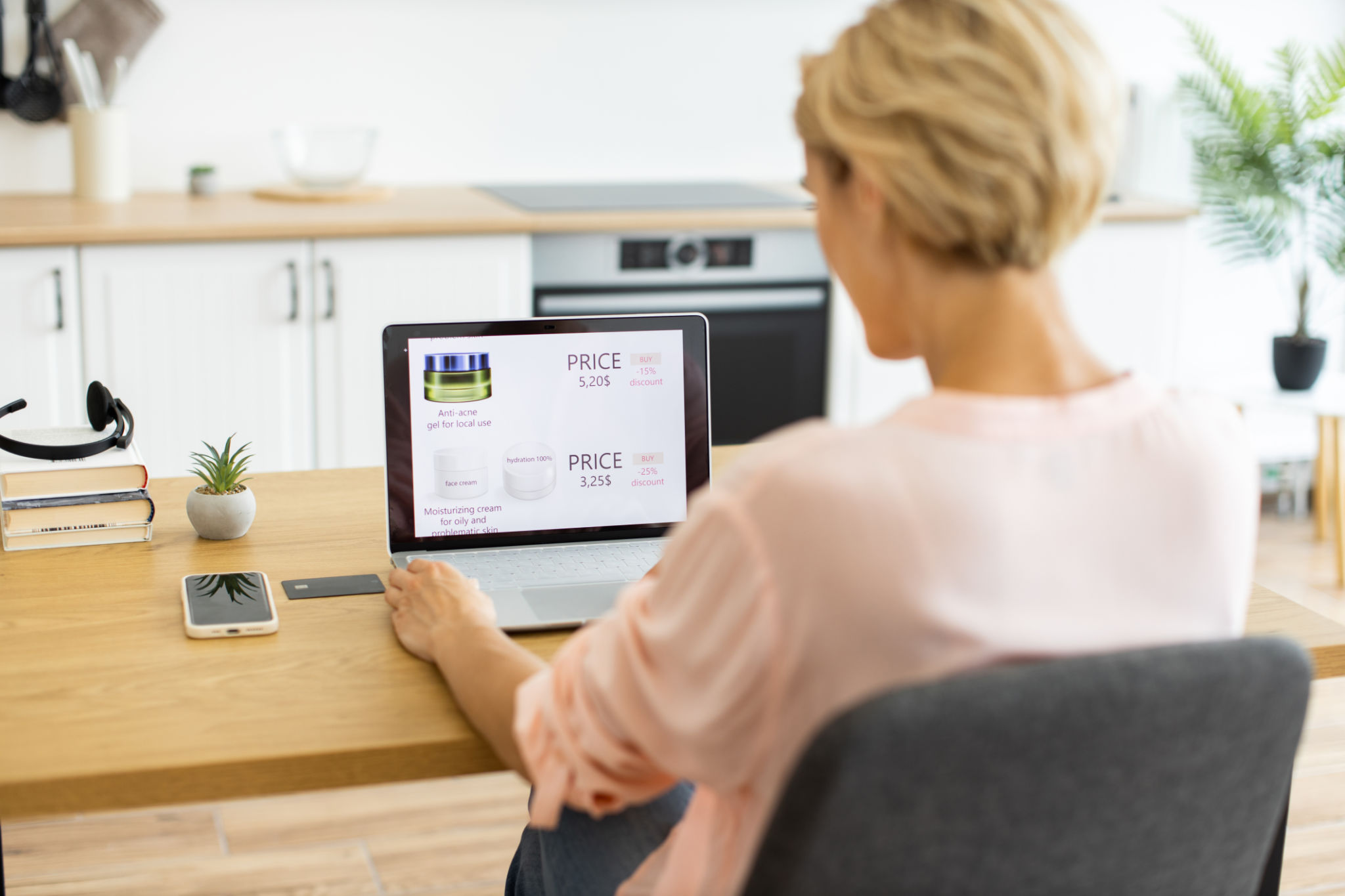 comparing prices on laptop