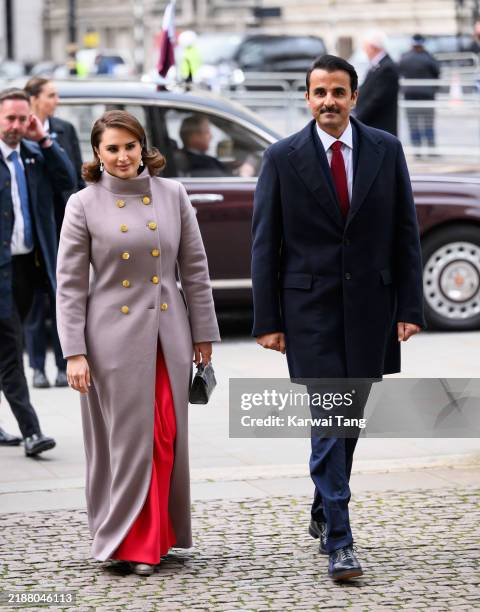 Qatar's Emir Sheikh Tamim bin Hamad al-Thani and his wife Sheikha Jawaher bint Hamad bin Suhaim al-Thani during a visit to Westminster Abbey on day...