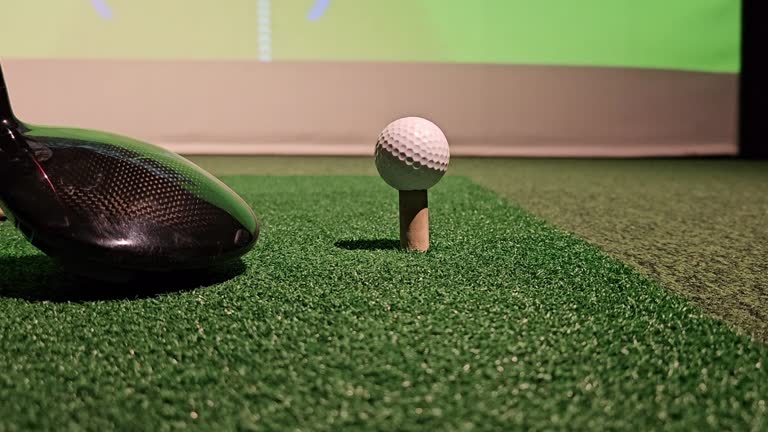 https://media.gettyimages.com/id/2188048069/video/indoor-golf-driving-range-with-modern-technology-for-swing-practice-in-a-simulated-environment.jpg?b=1&s=640x640&k=20&c=e3_QtLrpFRnYz8QAGklI-iKD7KTEH82ZPFRFFkhMZtg=