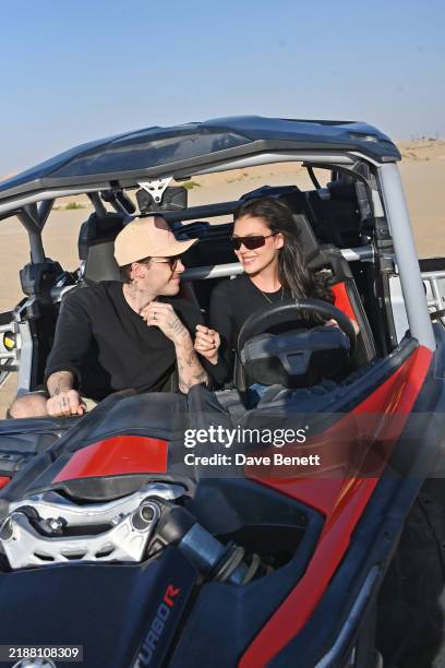 Brooklyn Beckham and Nicola Peltz take on the Abu Dhabi sands on a Desert Safari, adding excitement to their romantic getaway, on December 7, 2024 in...