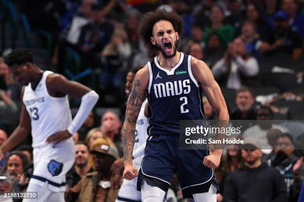 Dereck Lively II of the Dallas Mavericks reacts after scoring during the first half of an Emirates NBA Cup game against the Memphis Grizzlies at...
