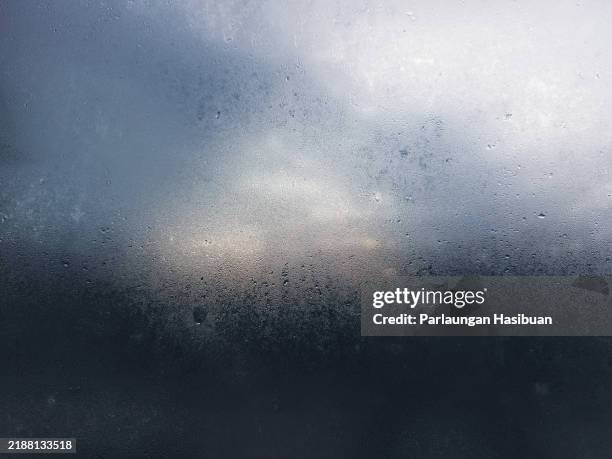 aesthetic dew or steam on glass with sun background - vidro imagens e fotografias de stock