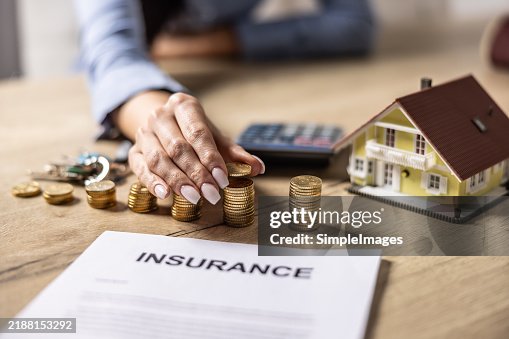 Saving money for real estate investment with pile of coins for financial or insurance concept stock photo Saving money for real estate investment with pile of coins for financial or insurance concept stock photo