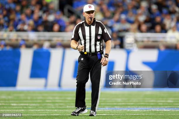 Referee John Hussey blows the whistle during a game between the Detroit Lions and the Green Bay Packers in Detroit, Michigan USA, on Thursday,...