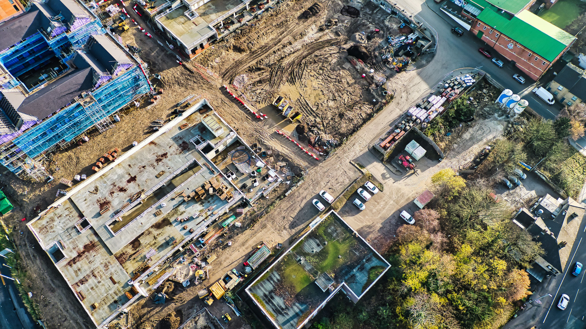 Aerial View of Construction Site with Buildings and Excavated Land in Kirkstall, Leeds. Aerial View of Construction Site with Buildings and Excavated Land in Kirkstall, Leeds.