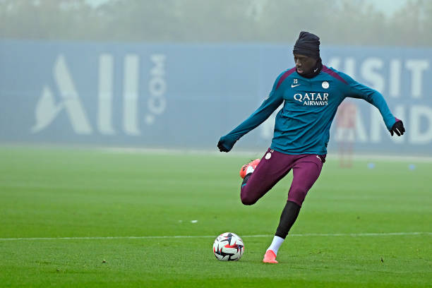 Randal Kolo Muani kicks the ball during a Paris Saint-Germain training session at Campus PSG on December 04, 2024 in Paris, France.