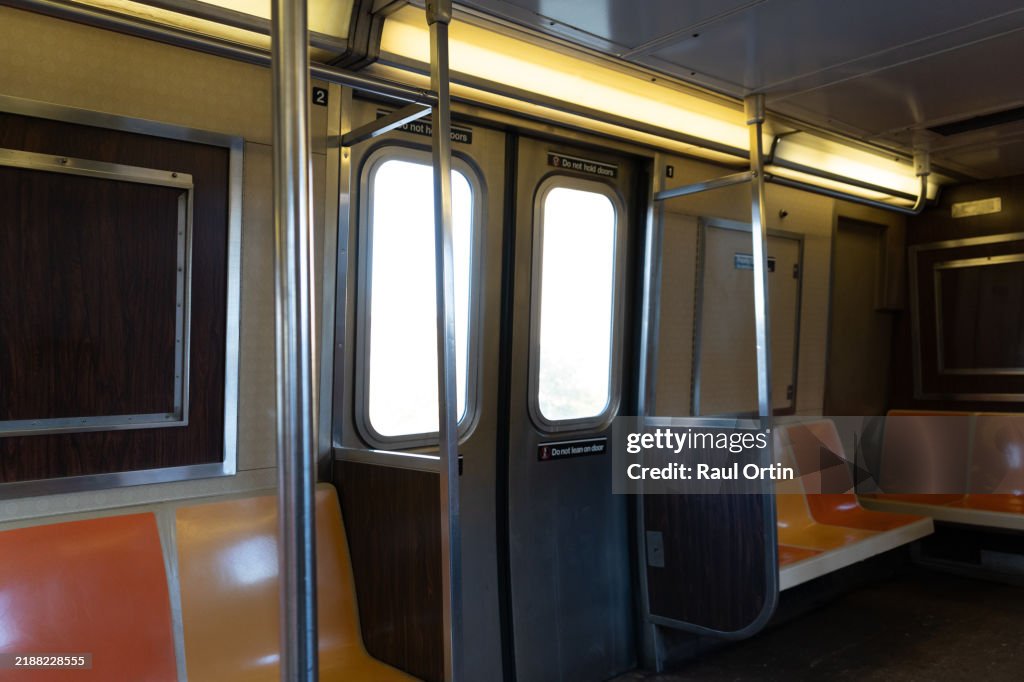 Empty car seats in New York city subway