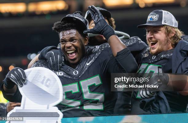 Marcus Harper II of the Oregon Ducks and Charlie Pickard of the Oregon Ducks celebrate following the game against the Penn State Nittany Lions at...
