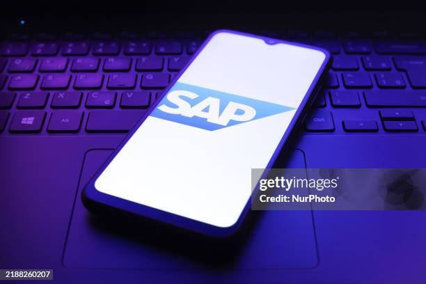 The SAP logo appears on the screen of a smartphone in Reno, United States, on December 7, 2024.
