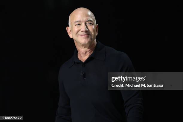 Jeff Bezos, founder and executive chairman of Amazon and owner of the Washington Post, takes the stage during the New York Times annual DealBook...