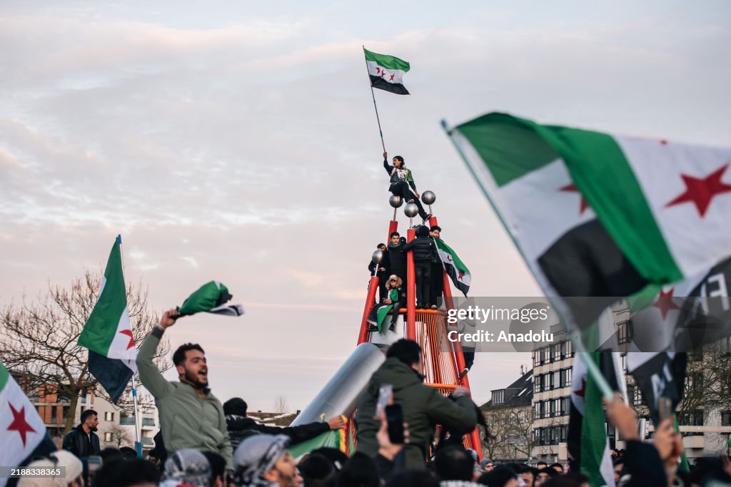 Overthrow Rule Syrians living in Essen gather to celebrate the overthrow of the ...