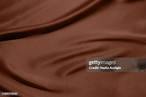draped silk background. color of the year 2025 - mocha stock pictures, royalty-free photos & images