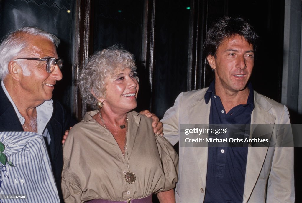 Harry Rek American actor Dustin Hoffman, wearing a white blazer over a blue ...