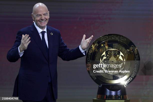 President Gianni Infantino presents The FIFA Club World Cup Trophy during the 2025 FIFA Club World Cup Draw at Telemundo Studios on December 05, 2024...