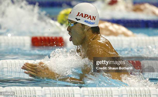 Kosuke Kitajima of Japan in action as he wins gold during the Men's 200m Breaststroke Final for the 10th Fina World Swimming Championships 2003 on...