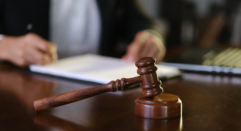 https://media.gettyimages.com/id/2188443414/video/judge-writing-notes-with-gavel-resting-on-sound-block.jpg?b=1&s=640x640&k=20&c=d8IJMU6NCyubHth0pFw5hWz9yPpe1BJhSSBKnjCmM5Q=