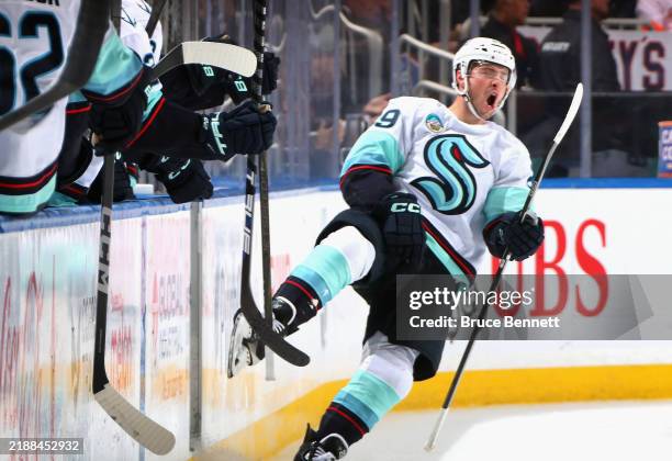 Vince Dunn of the Seattle Kraken celebrates his second period goal against the New York Islanders at UBS Arena on December 05, 2024 in Elmont, New...