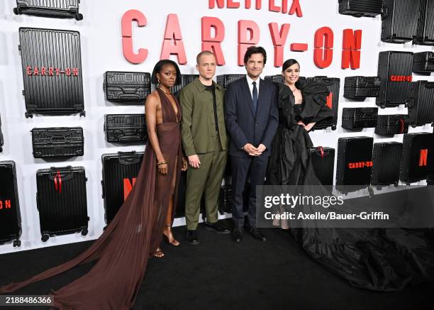 Danielle Deadwyler, Taron Egerton, Jason Bateman and Sofia Carson attend the Premiere of Netflix's "Carry-On" at The Egyptian Theatre Hollywood on...
