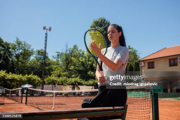 tennis player preparing for a match - tennis racket bag stock pictures, royalty-free photos & images