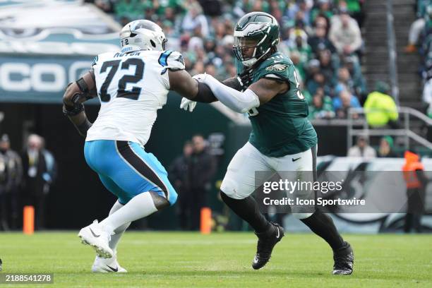 Carolina Panthers offensive tackle Taylor Moton attempts to block Philadelphia Eagles defensive tackle Jalen Carter during the game between the...