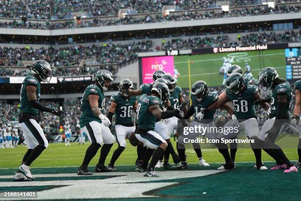 Philadelphia Eagles defense celebrates a turnover during the game between the Philadelphia Eagles and the Carolina Panthers on December 08, 2024 at...