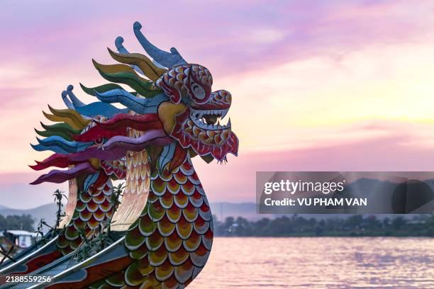 pink sunset on the perfume river in hue city, central vietnam - vietnamese culture stock pictures, royalty-free photos & images