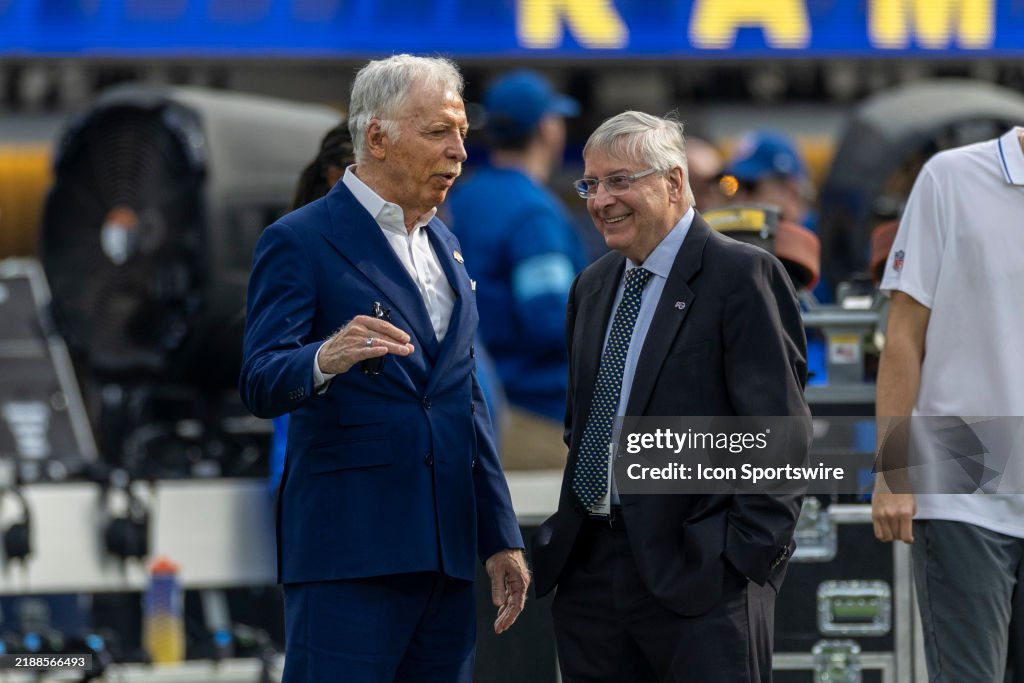 Los Angeles Rams owner Stan Kroenke, left, speaks with Buffalo Bills ...