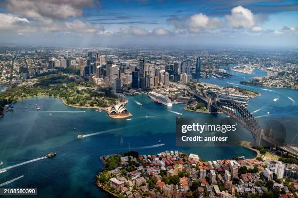 drone shot of the beautiful sydney harbor - sydney stock pictures, royalty-free photos & images