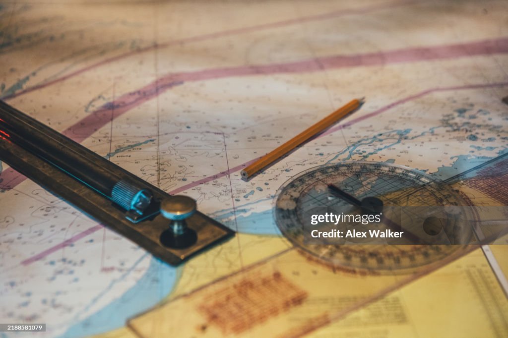 Ship Using Navigation Chart Nautical Chart With Navigational Tools On Ships Bridge High-Res Stock ...