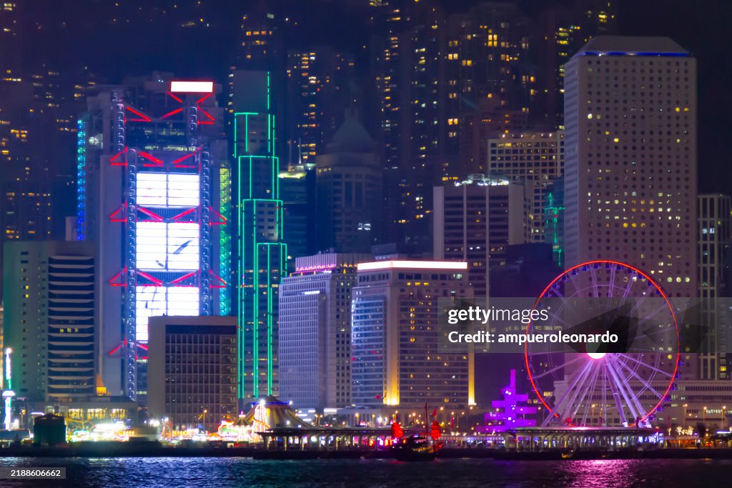 Night landscape view from Victoria Harbour to Hong Kong, China.